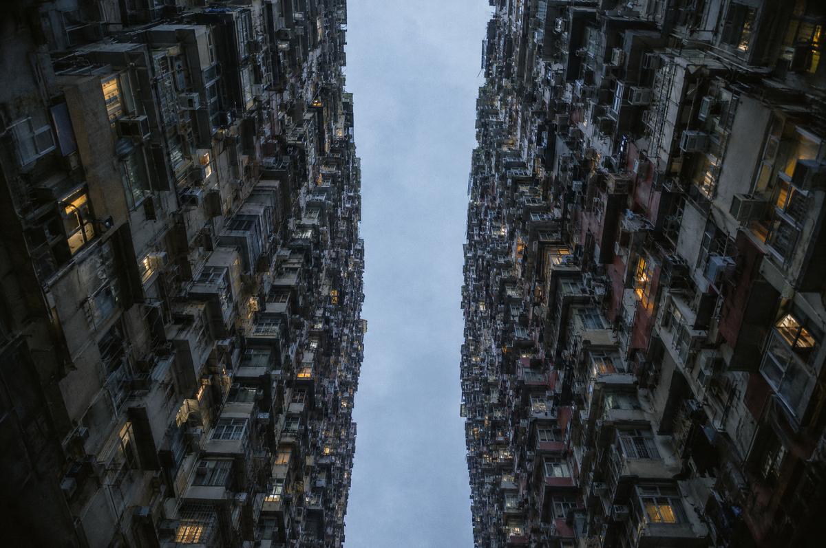 Looking up between dense residential towers in Quarry Bay, Hong Kong